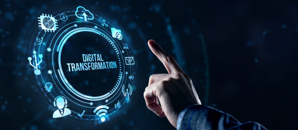 Hand pointing to a digital interface with icons representing digital transformation and technology integration