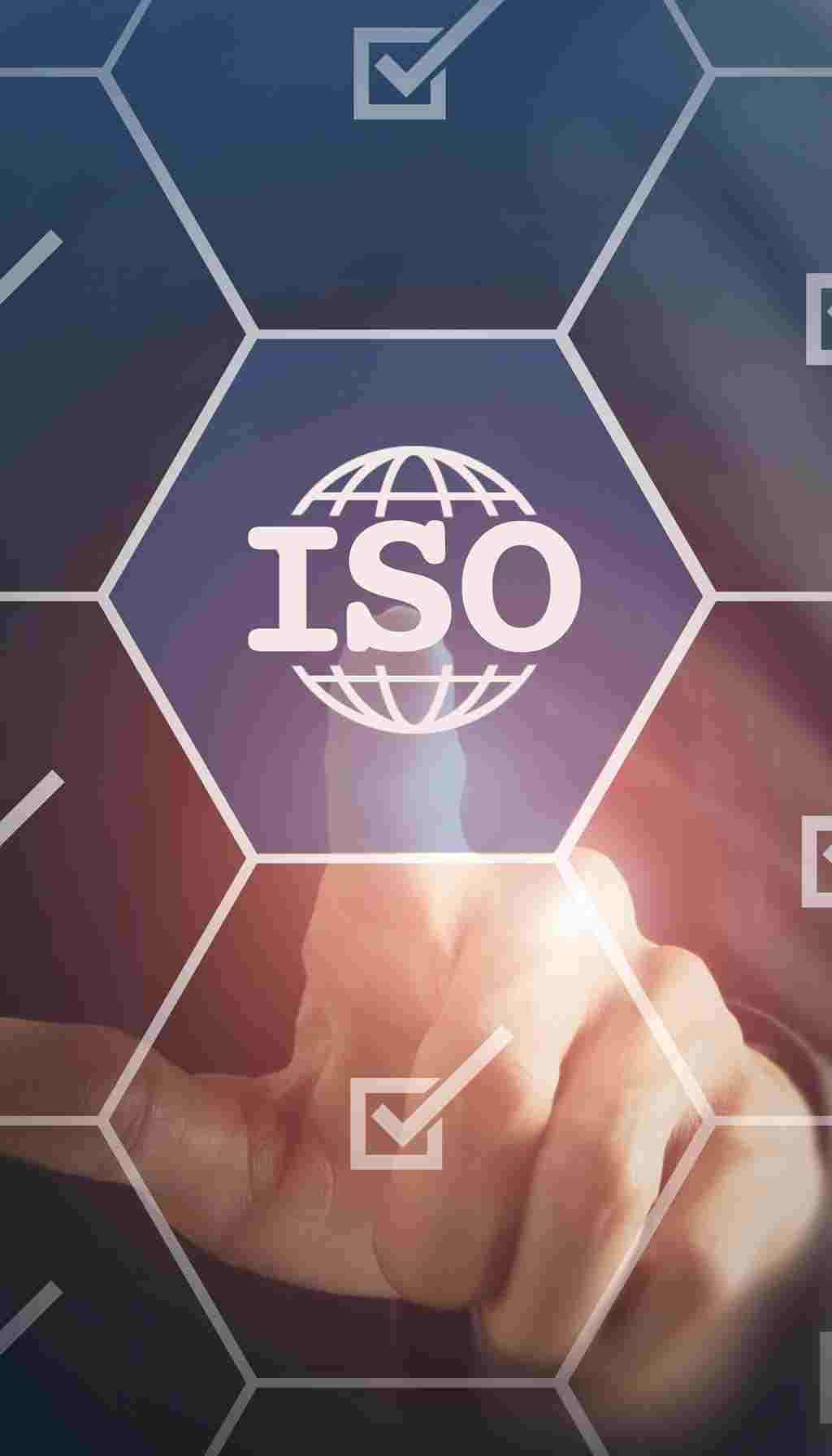 workplace regulations (28) Business professional pressing digital screen with ISO 9001 Quality Management System checkmark, symbolising modern quality standards.