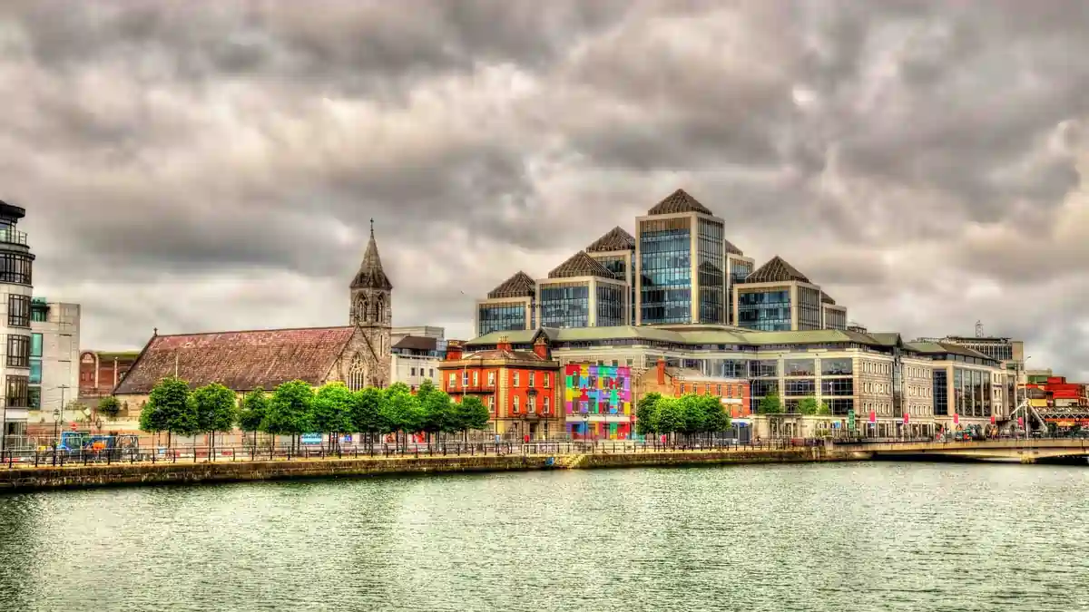 Dublin Docklands office and business district along the River Liffey, representing Irish workplaces subject to health and safety and employer liability law.